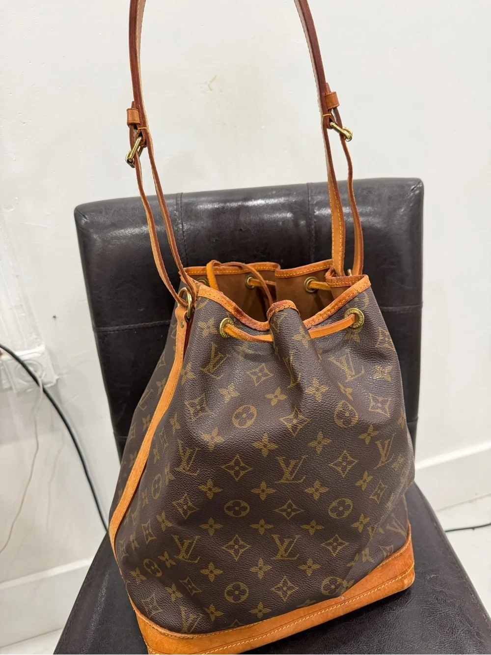 Louis Vuitton Monogram Drawstring Hobo in Brown and Tan